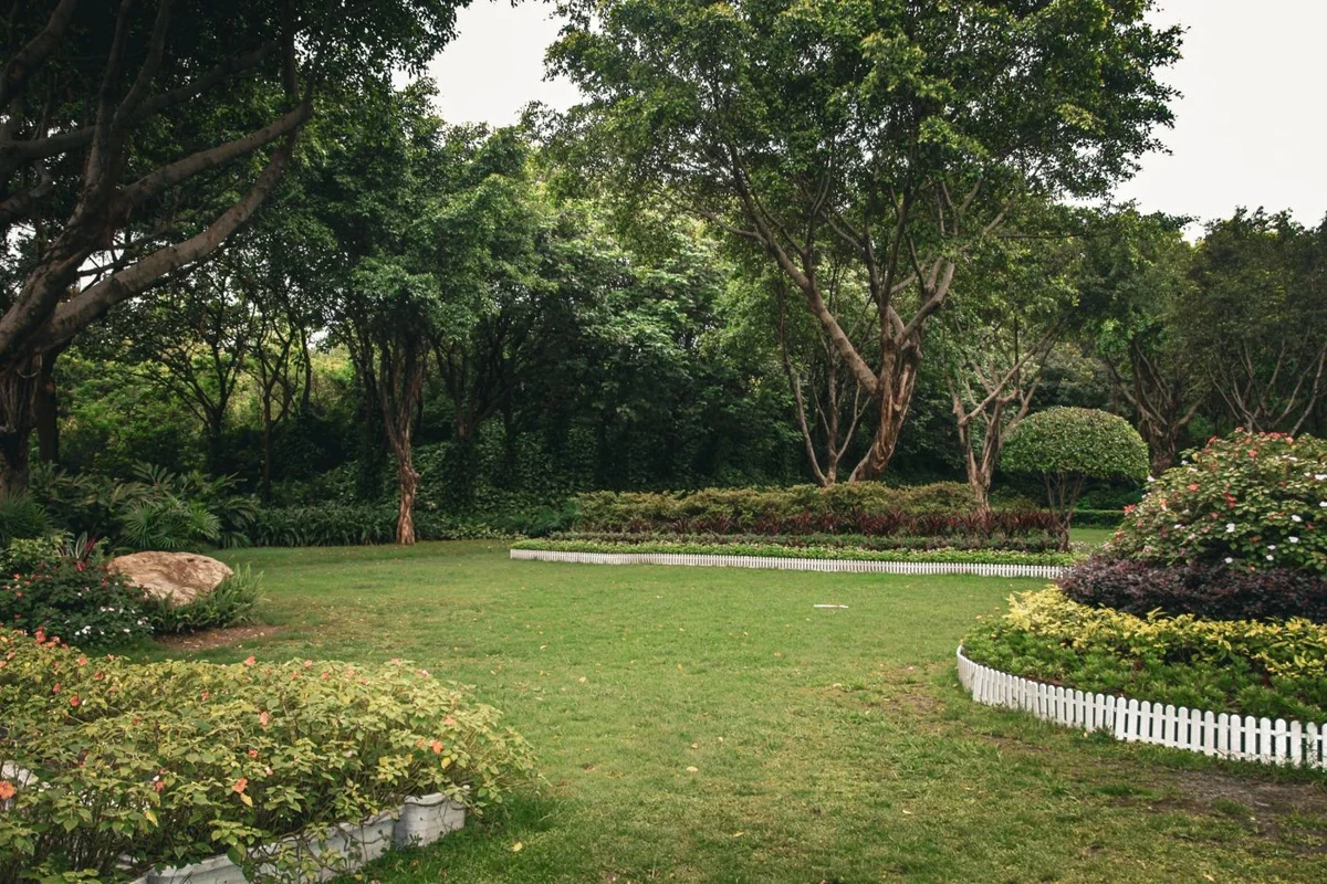 Garden combining trees shrubs flower beds and lawn